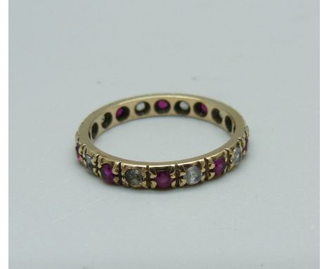 A 9ct gold, red and white stone eternity ring, 1.8g, N 