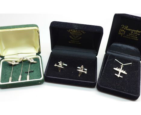 A pair of silver Spitfire cufflinks, three silver RAF stick pins and a silver plane pendant 