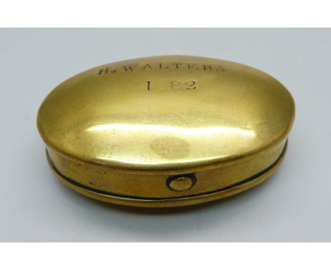 A Victorian brass tobacco or snuff box, 'H. Walters, 1882' 
