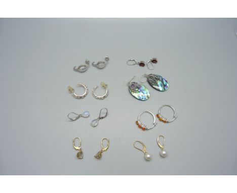 Eight pairs of earrings, set with semi-precious stones including Ceylon rainbow moonstone, orange Ethiopian opal, 0.75ct, gar