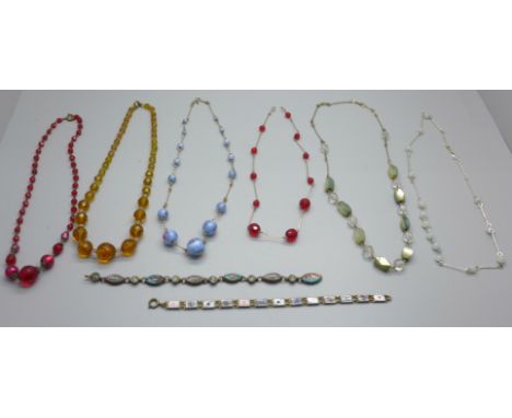 Six vintage necklets and two bracelets including one enamelled playing card bracelet 