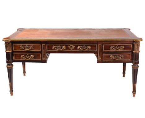 Wright & Mansfield (1861-1884); an Empire-style mahogany kneehole Bureau Plat of exhibition quality, the top with radiused co