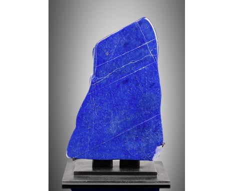 Bloc de lapis-lazuli sur socle Lapis Lazuli Free-form Sculpture on BaseAfghanistan A large boulder of lapis lazuli which has 