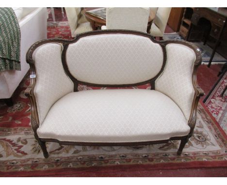 Small carved walnut salon sofa