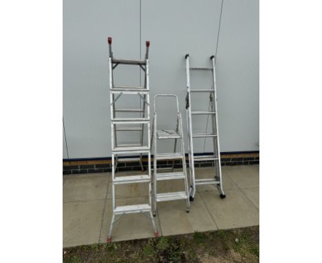 Three aluminium step ladders including one extending ladder