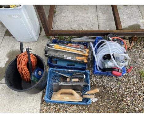 Four boxes of tools including a tile cutter, power leads etc
