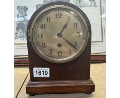 A domed top mantel clock. In working order.