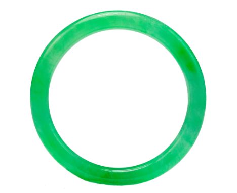 A carved jadeite bangle (guaranteed untreated) W.t 26.3g size 7.7cm x 7.7cm