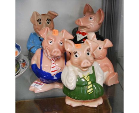 A set of five Wade Natwest money-box pigsCondition report: Baby pig missing stopper.All grubby but no apparent chips or crack