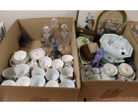 Two boxes of miscellaneous china and glass, to include Limoges part tea sets, decanters and stoppers, 1930s oak cased mantel 