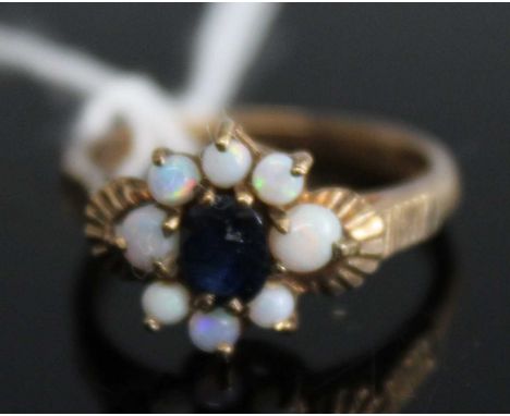 A ladies 9ct gold sapphire and opal set flowerhead cluster ring, 2.6g, size L