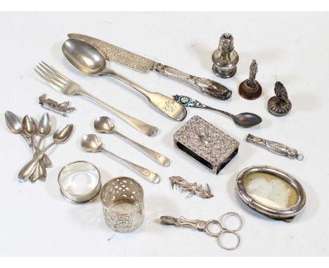 A collection of miscellaneous items, to include an Edwardian silver matchbox sleeve, having repousee decoration, a pair of 19