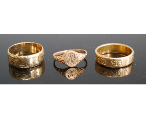 A 9ct gold wedding band 3.5g, together with a yellow metal mourning ring (formerly with black enamel decoration, unmarked but