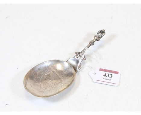 A late 19th century continental combination fork and spoon, the spoon having a shallow bowl engraved with a crowned heraldic 