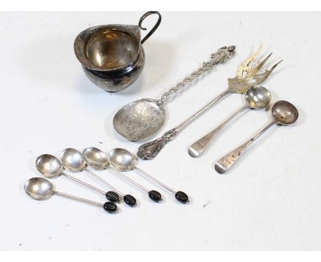 A late Victorian silver cream jug of plain undecorated form together with various loose silver coffee bean spoons, silver mus