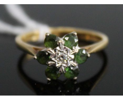 A modern 18ct gold emerald and diamond flowerhead cluster ring, 3.6g, size Q