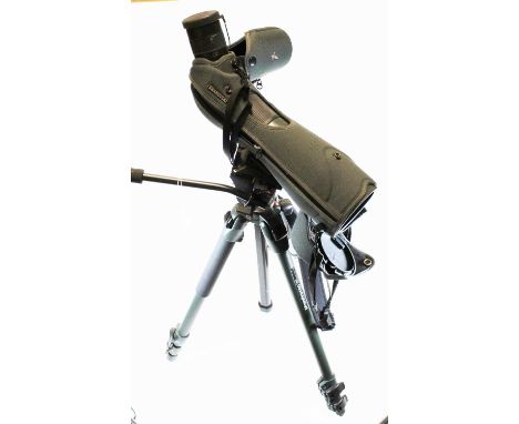 A Swarovski HD80 optical telescope on tripod with instruction manual