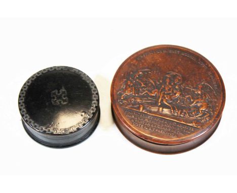 A 19th century pressed horn snuffbox, of cylindrical form, the removable cover relief decorated with a battle scene, titled '