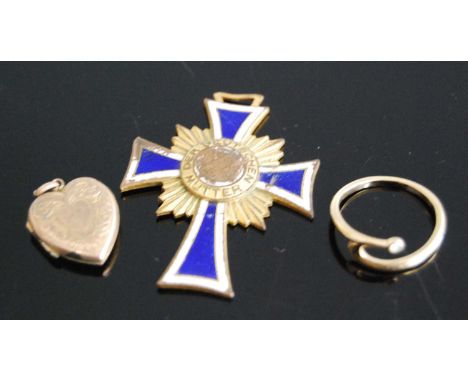 A gold plated heart shaped locket, gilt metal dress ring, and a German cross of honour medal (3)