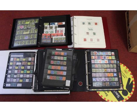 A collection of various stamps in ring binders and albums, mainly being Elizabeth II examples 
