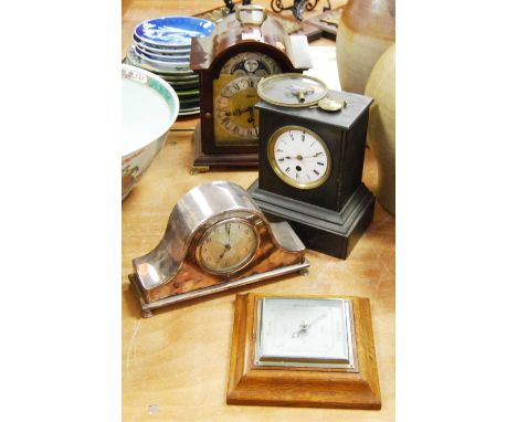A Victorian black slate mantel clock the enamel dial showing Roman numerals, height 23cm; together with a reproduction mahoga