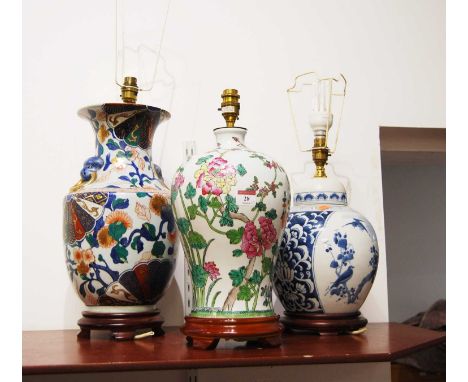 A 20th century Chinese Meiping shaped  vase, converted into a table lamp, decorated with flowers, height 42cm, together with 