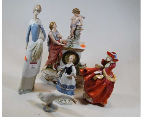 A small collection of ceramics to include a Nao porcelain figure of a lady, a Royal Doulton figure: Top-o-the-hill, a Lladro 