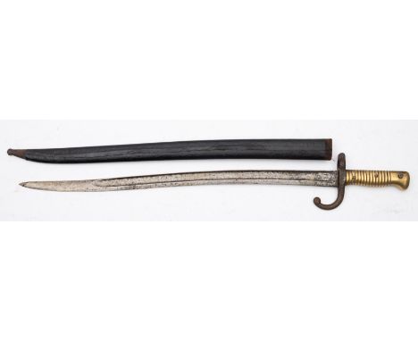 A Chassepot bayonet, the curved single edge, single fuller blade over single quillon hilt and ribbed brass grip, in a canvas 