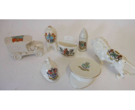 W H Goss and others, seven Military and other crested china pieces, including army peak cap, infantry helmet, British aerial 