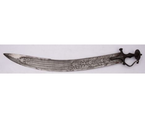 A 19th-century 'execution' sword Tulwar, curved single edge Damascus steel blade with clipped back point, the upper section w