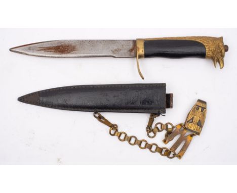 A WWII Italian Fascist Dagger, the straight single edge blade over gilt brass hilt with single quillon, one piece wooden grip