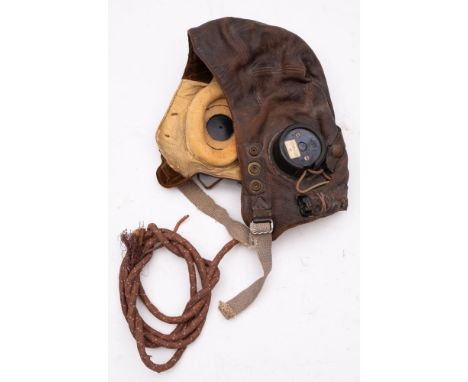 A WWII RAF Type C leather flying helmet, fitted black Bakelite headphones stamped with broad arrow and numbered '10A/13466'
