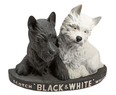 A large 'Black & White' Scotch Whisky' Advertising figure, 58cm hiigh, 