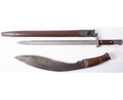 A Spanish 1893 pattern bayonet, the straight single edge fullered blade over  hilt and two piece wooden grip in a  brown leat