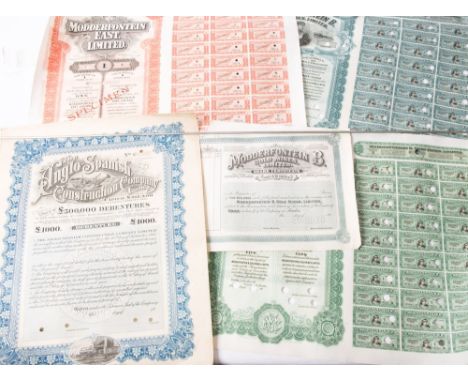 A collection of various share certificates, including 'Anglo Spanish  Construction Company Ltd', 'Modderfontein B. Gold Mines