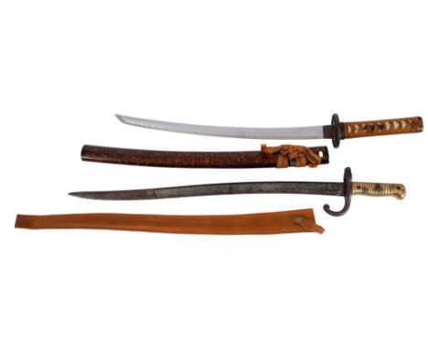 A WWI period Chassepot bayonet in later leather scabbard, together with a reproduction wakizashi  (2) 