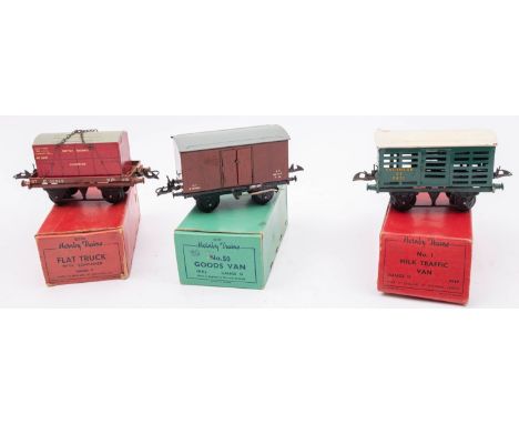 A Hornby O gauge boxed group of rolling stock,  comprising Flat Truck with Container, No,1 Crane Truck, No 50 Goods Van, No.1