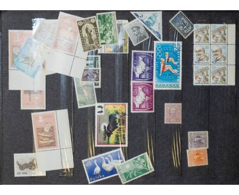 An accumulation of stamps and first day covers.