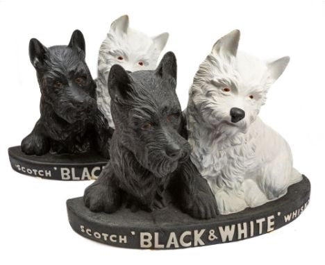 Two  'Black & White' Scotch Whisky' Advertising figures of small size, 21cm high.