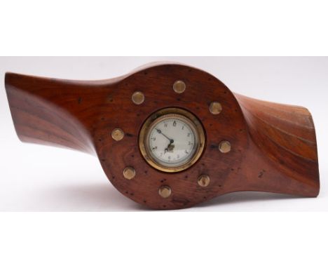 An early 20th century propeller mantel clock, the central boss section stamped with airspeed rating and serial numbers, ' DRG