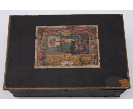 Magic Lantern 'Lanterna Magica', original boxed magic lantern, with a collection of colour printed slides, box width 30 cm.