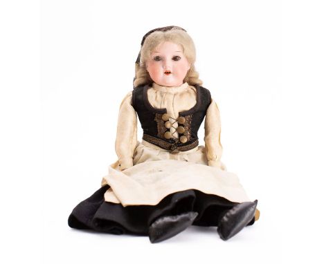 An Armand Marseille bisque head doll in Icelandic  'Faldbuningur' costume, applied blonde wig, brown glass sleeping eyes, ope