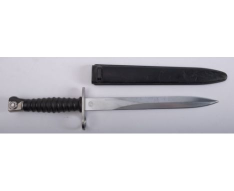 A mid 20th century Swiss GE 47 rifle bayonet,maker Wenger, the straight double edged blade stamped 'V 142589' to one side and