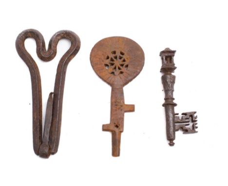 A French Lantern key, 17th/18th century: together with an iron door knocker and a decorative flat iron key (3) 