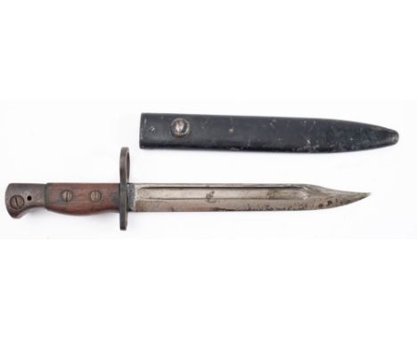 A Lee Enfield No.5 'Jungle Carbine' bayonet, the single edge fullered blade with clipped back point stamped 'WS' and '294' to