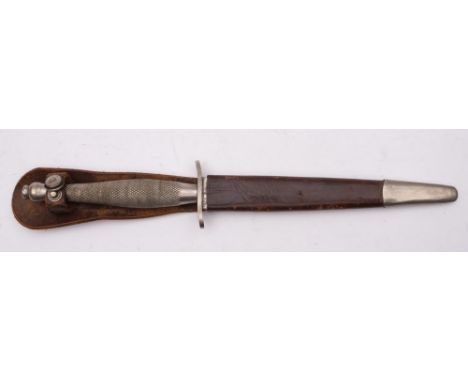 A Fairbairn Sykes First Pattern Fighting Knife, maker Wilkinson Sword, London, the straight double edge blade stamped as per 