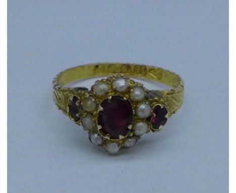 A Victorian 15ct gold, ruby and seed pearl ring, Chester 1881, Pendleton & Sons, 1.7g, K