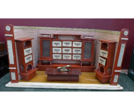 An early 20th Century spice/herb rack, made by the Blind Institute, Nottingham