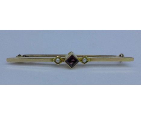 A 15ct gold, seed pearl and pink stone set brooch, 2.1g