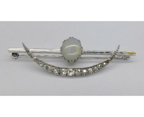 An Art Deco white metal set, opal and diamond brooch, 5.9g, 56mm